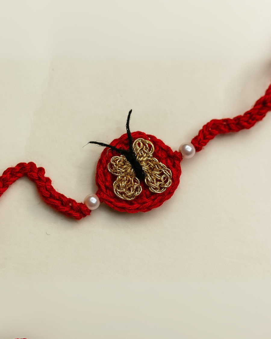 The silver butterfly crochet rakhi
