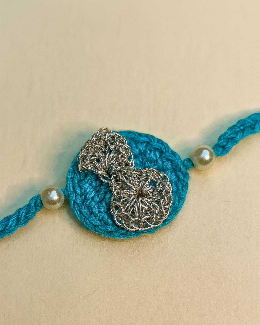 Silver bow rakhi