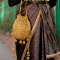 Dilruba Suvarna golden Jaal Potli