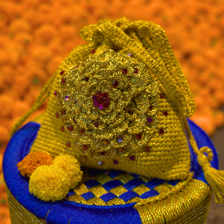 Amber Bloom Embellished Crochet Potli