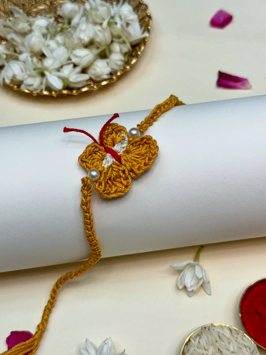 The yellow butterfly rakhi