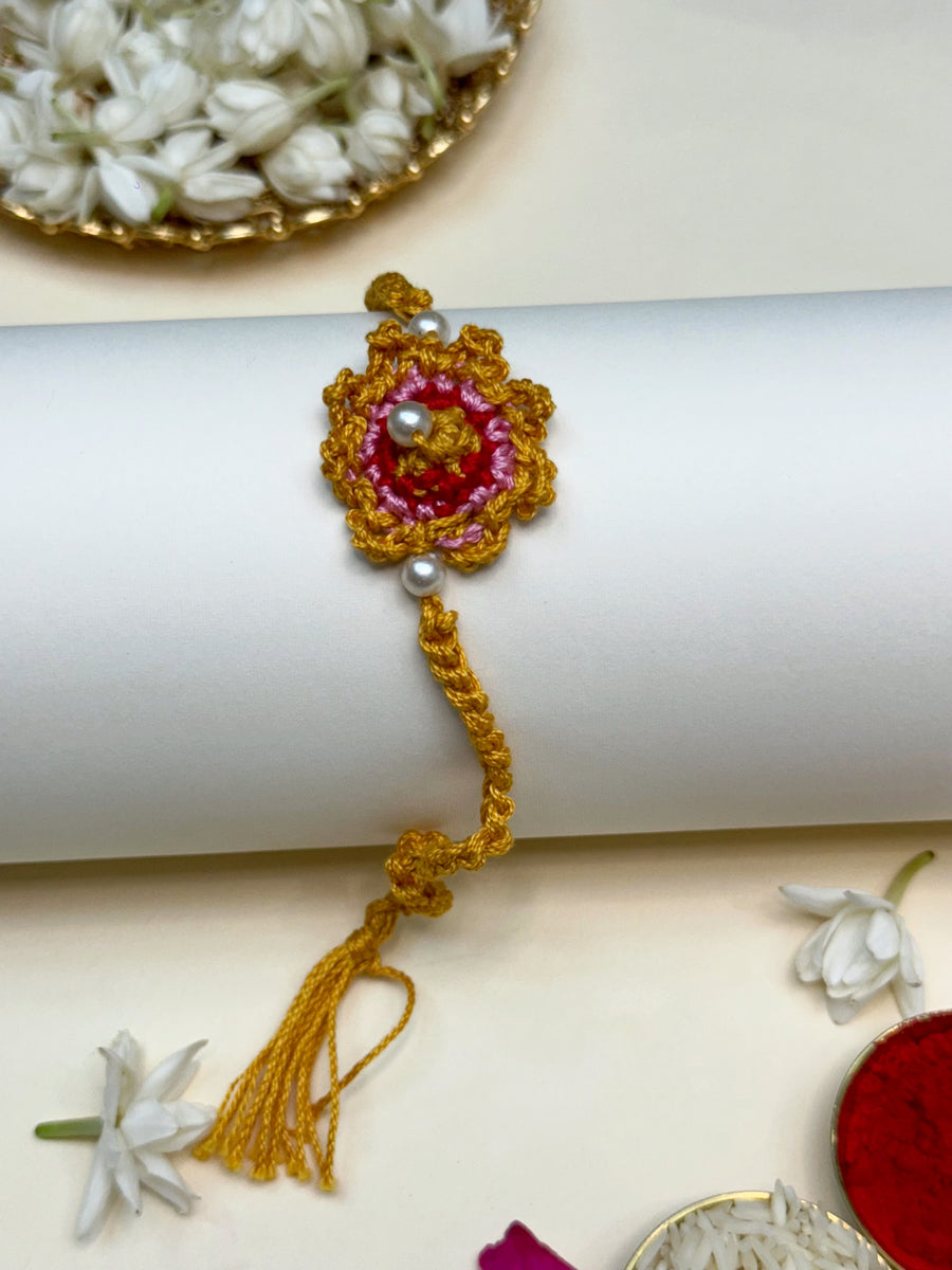 The colored flower rakhi