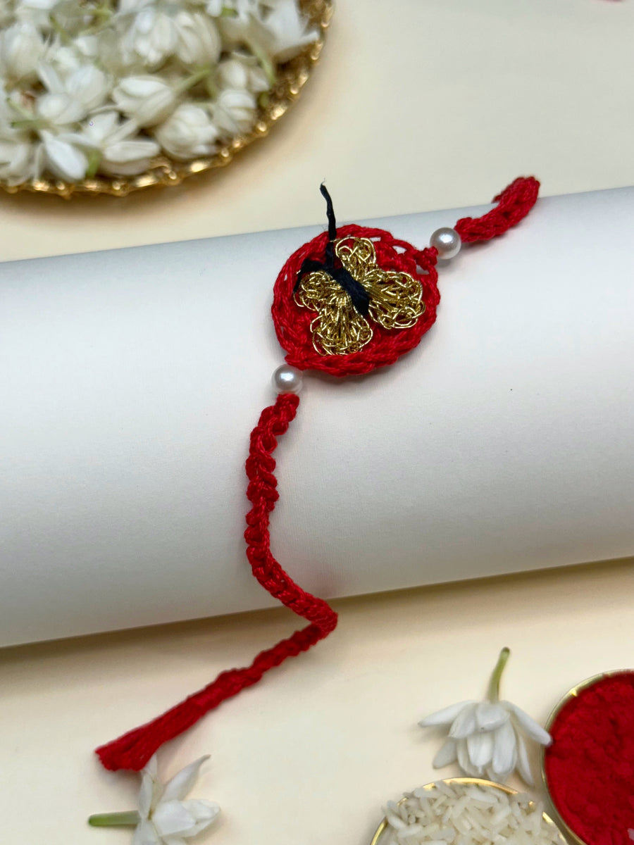 The silver butterfly crochet rakhi