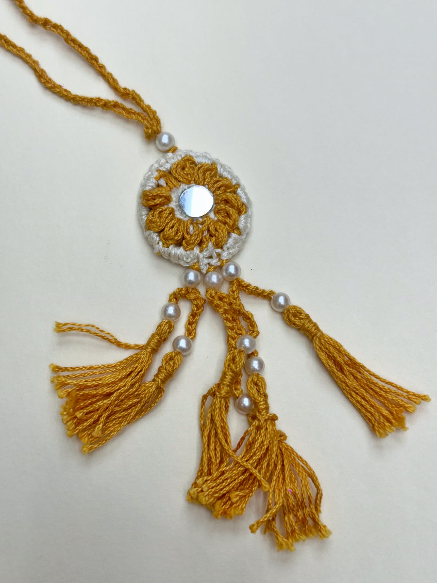 Yellow and white Rakhi duo