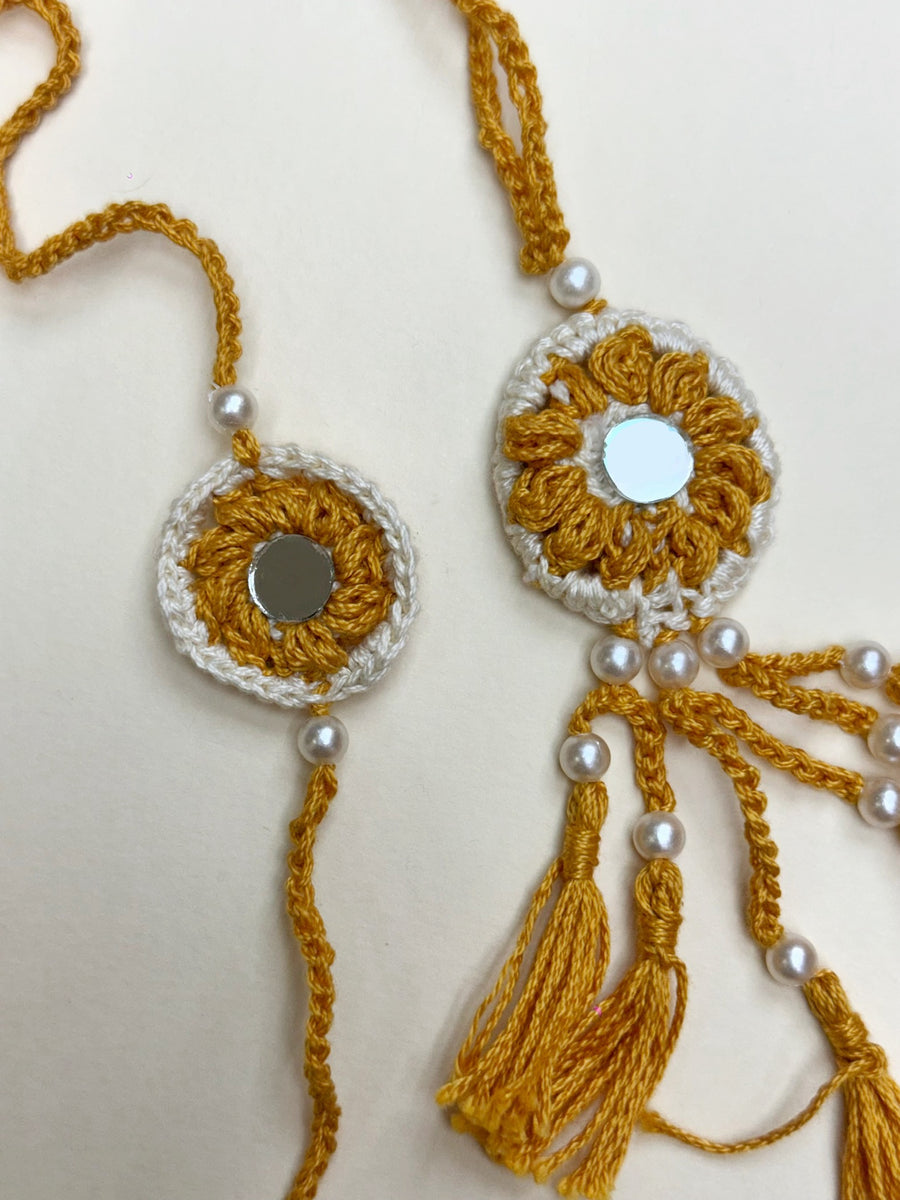 Yellow and white Rakhi duo