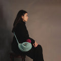 The Drum Sling Crochet Sling Bag